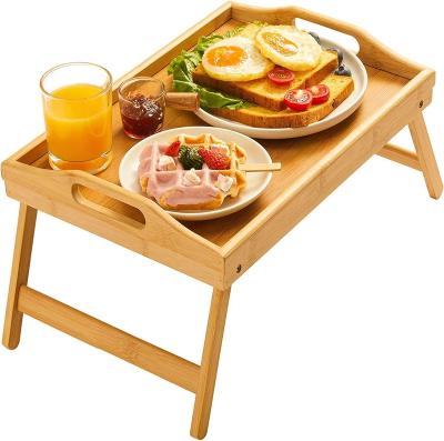 China Sustainable Wholesale Bamboo Bed Tray Table With Legs Foldable Snack Serving Tray Folding Breakfast Table For Sofa for sale