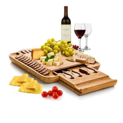 China Charcuterie Sustainable Square Board Cheese Board And Bamboo Knife Set With Knives Drawer for sale