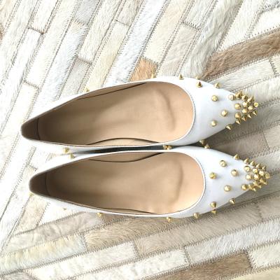 China Gold Rivets Flat White Leather High Pointed Toe Women Comfortable Shoes Manufacturer for sale