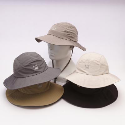 China Male Waterproof Nylon Outdoor Round Bucket Foldable And Waterproof Hat With Chin Strap for sale