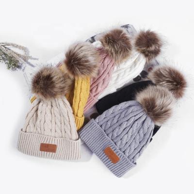 China Custom Logo Unisex Acrylic Cotton Pom Wholesale COMMON Pom Kids Children Knit Winter Beanie Hats for sale