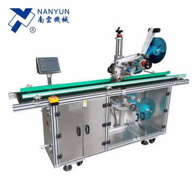 China NY-829 Fully Automatic CLOTHING Top And Bottom Double Sided Flat Surface Sticker Labeling Machine for sale