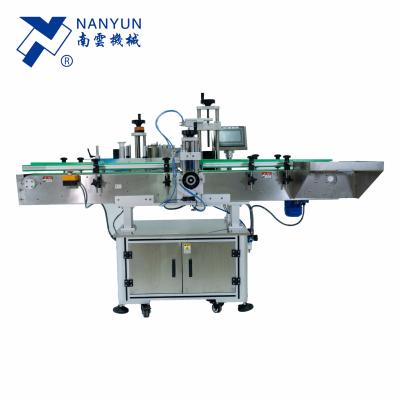 China NY-822B positioning function sticker labeling machine for vertical wrap around PET glass bottles cans jars cans for sale