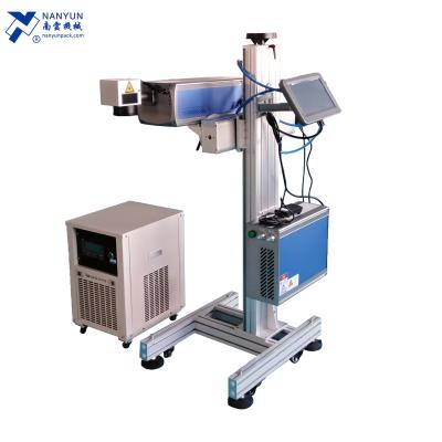 China NV5808 Water Cooled UV Laser Coding Cutting Machine on Plastic Sheet for Vertical Forming Filling Sealing Machine for sale