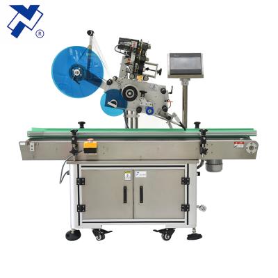 China NY-817 automatic food labeling machine for medicine box corner sealing or barrels side for sale