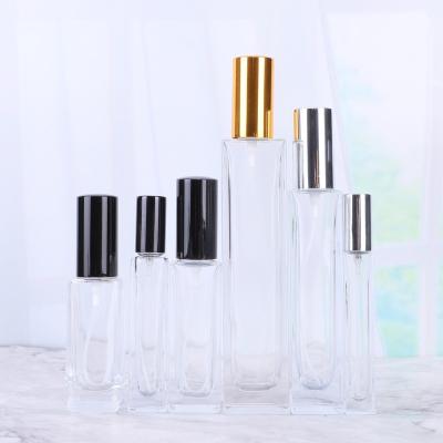 China Personal Care 50ml Cylinder Perfume Bottle Clear Refillable Glass Thick Bottom Atomizer Bottle Manufacturers Wholesale for sale