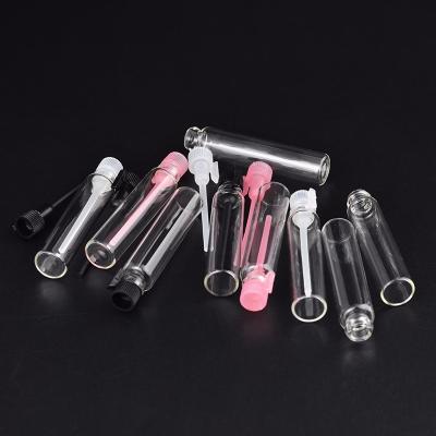 China 2ml Mini Empty Personal Care Glass Vials For Perfume Sample And Transparent Glass Tubular Vials With Plastic Stick for sale