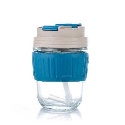 China Minimalist Design Eco Friendly Clear Transparent Reusable Coffee Fashion Glass Cup With Silicon Sleeve for sale