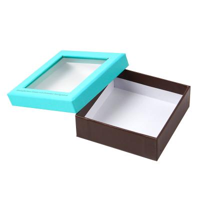 China Luxury Recycled PVC Window Clear Gold Foil Materials Cardboard Paper Gift Rigid Perfume Box Premium Window Packaging for sale