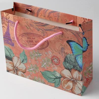 China Recyclable Wholesale Fashion Custom Boutique Clothes Shopping Gift Packaging Luxury Paper Gift Bag for sale