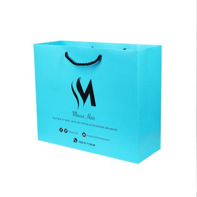 China Recyclable Hot Foiled Stamping Black Matt Kraft Paper Bag With Cotton Rope Handles for sale