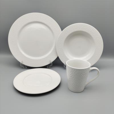 China Sustainable 16 Piece Porcelain Round Embossed Dinnerware Set Service For 4 for sale