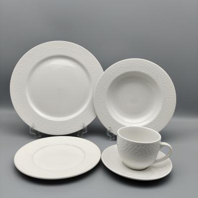 China Sustainable Porcelain Round Embossed Tableware Set Water Cube Design for sale