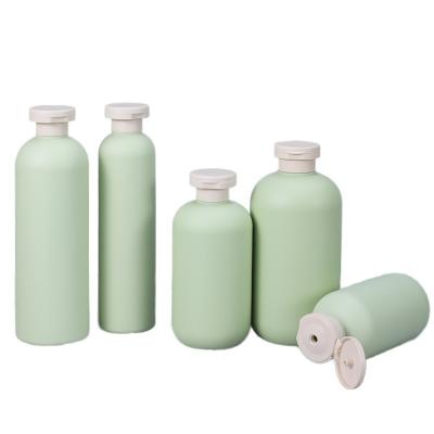 China Flip Top Cap Pump Packaging for Cosmetic Skincare in Avocado Green Empty Squeeze Bottle for sale