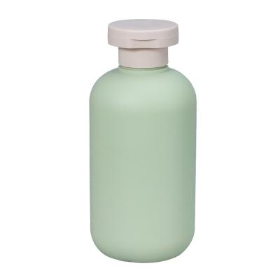 China 200ml 260ml 300ml 400ml 500ml Avocado Green Plastic Lotion Bottle With Flip Top Cap for sale