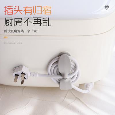 China Behind Doors/On Walls Cable manager wall storage data cable fixer kitchen power cord clip socket winder for sale