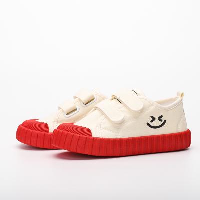 China Small Toddler Boy and Girl Adjustable Strap Sneaker Soft Canvas Shoes Fashionable Flat Children Kids School Shoes Wholesale Kids Walking Shoes for sale