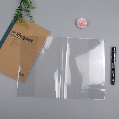 China Wholesale Eco-friendly transparent clear plastic book cover PVC, cover waterproof china book wrapping paper self-adhesive book cover for sale