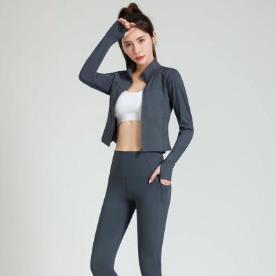 China Fashion Short Yoga Clothes Zipper Ladies Finger Sleeve Breathable Sports Jacket For Women for sale