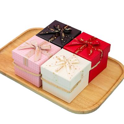 China Recycled Materials Empty Corrugated Cardboard Luxury Custom Expensive Christmas Gift Box With Handle Wholesale for sale