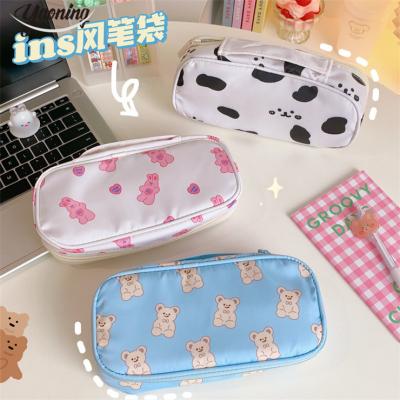 China Gift Cheapest 2023 Trendy school custom waterproof zipper canvas pencil case stationery large capacity animal prints foldable pen bag for sale