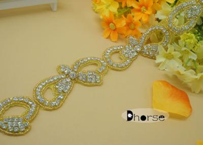 China Light Gold Base Bow Shape Crystal Rhinestone Trimming For Dress for sale