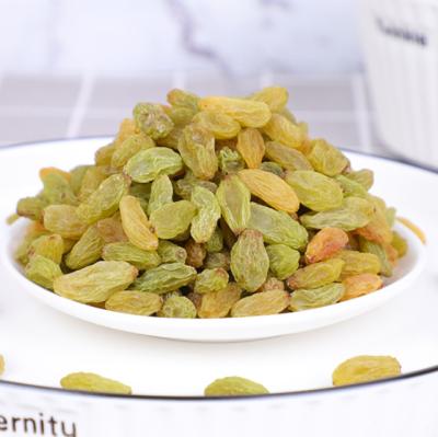 China Medium Jumbo Size 90% Green 70% Green Green EDIBLE Quality 50% Green Raisins Xinjiang Origin for sale