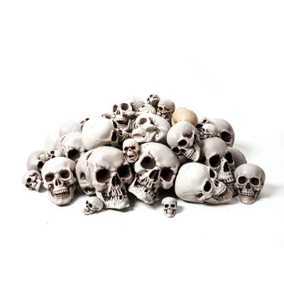 China Newest Plastic Skull Ornaments Background Decoration Props Graveyard Party Props Halloween Skeleton Stand for sale