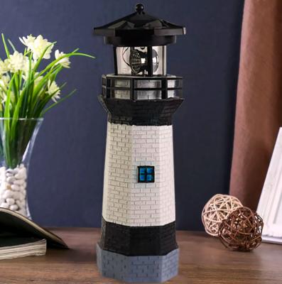 China Europe Resin Flags Gifts Lighthouse With Rotating Solar Lamp Outdoor Decor Beacon Led Lights For Garden Patio for sale