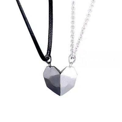 China Creative Romantic Silver And Black Magnetic Love Rope Heart Friendship Couples Couples Jewelry Pendant Set for sale