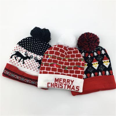 China Winter COMMON Warm Protection Kids Christmas Beanie Hat Embroidery Jacquard Knit Luxury Red Beanie Hat for sale