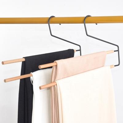 China Modern Customized Wooden Multi-Layer Magic Metal Trouser Hanger Space Saving Multifunctional for sale