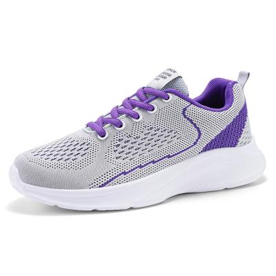 China Fashion\comfortable\durable\breathable\lit 2022 new fashion sneakers fly ladies woven breathable comfortable casual sneakers for sale