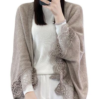 China Anti-wrinkle 2023 new woman lace cardigan shawl foreign fashion languid style solid color knitted cardigan for sale