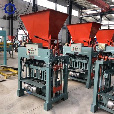 China Buliding construction fly ash brick making machine paver interlocking block latest manual clay brick machine with hopper for sale