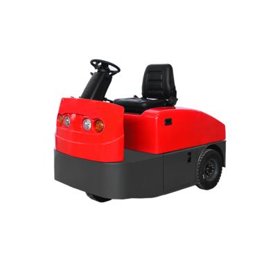 China Building Material Shop Adjustable Steering Wheel Towing Mini Seated Electric Tow Tractor 6 Ton 6000kg Load Pusher for sale