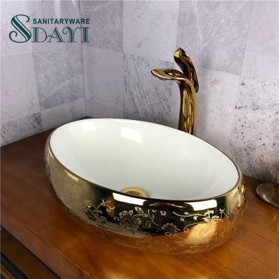 China Modern Sanitary Ware Luxury Gold Ceramic Bathroom Basin Countertop Oval Color SDAYI Art Sink Price for sale