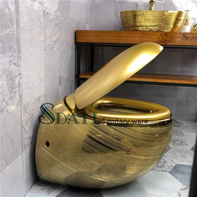 China Hidden Tank SDAYI Bathroom Egg Shape Around Wall Hung Toilet Ceramic Gold New Design Wall Hung Toilet for sale