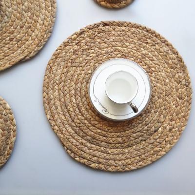 China 2021Hot Sale Good Quality Heat Insulation Woven Woven Rattan Table Sustainable Bamboo Mat Natural Dining Round Woven Place Mat for sale