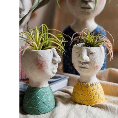 China Hot Selling Design Human Boughpot Flower Vase Europe Family Face Flowerpot Handicarfs Handicarfs Tabletop Plant For Sale for sale