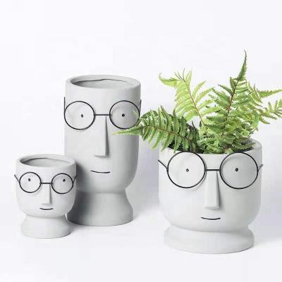 China Creative Abstract Cement Stand Flower Pot Garden Handicarfs Main Flower Pot Europe Large For Sale for sale