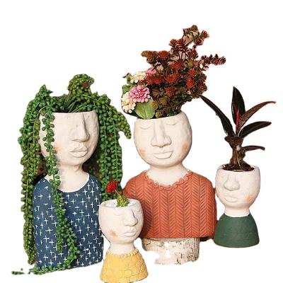 China Europe Design Family Face Flower Pot Handicarfs Human Plant Pot Nordic Best-selling Garden Flower Stand Bonsia For Sale for sale