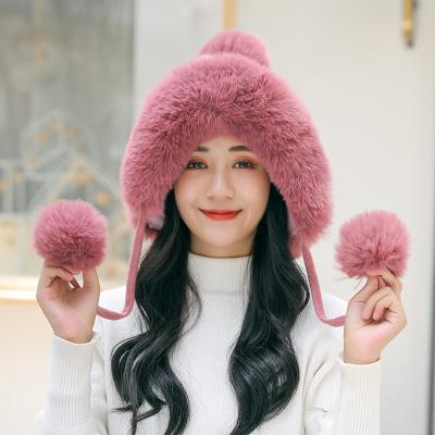 China JOINT Women's Trapper Earflap Warm Bomber Hat Winter Hat With Pom for sale