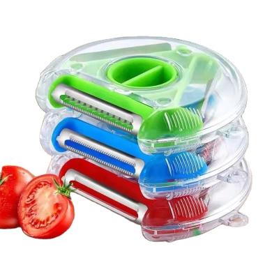 China Viable 3 in 1 Function Trio Slicer Fruit Potato Peeler Kitchen Tool Stainless Steel Magic Vegetable Cutter for sale