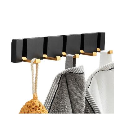 China Viable Black Gold Robe Hooks Towel Hanger Nail Folding Free Installation Wall Hooks Coat Clothes Rack For Bathroom Back Door Hook for sale