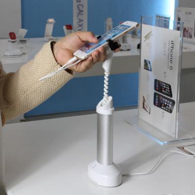 China Soporte de exhibición blanco de alarma del teléfono móvil del color del diseño impresionante del ASISTENTE con la alarma antirrobo del agarrador en venta