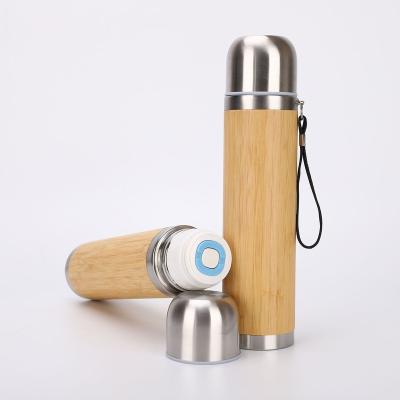 China New Eco-friendly customized bamboo shell water bottle Double wall stainless steel bullet bamboo vacuum flasks water bottle for sale