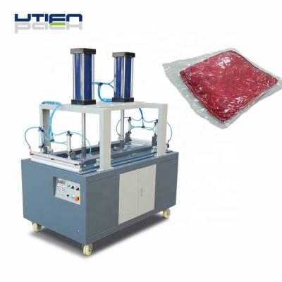 China Beverage Reducing Packing Volume Textile Cover Compress Vacuum Sealing Packaging Machine for sale