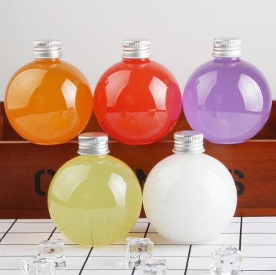 China food & Spherical Disposable Clear Pet Plastic Juice Beverage Packaging 500ml Beverage Bottles With Lid for sale