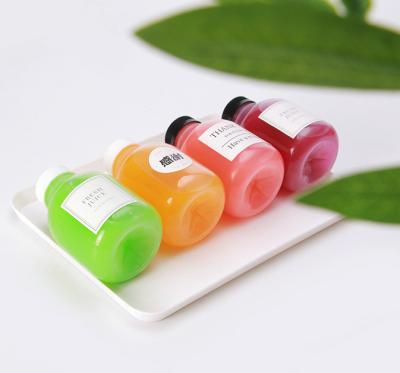 China food & Beverage Packaging Transparent Square Juicer PET Plastic Drinking Bottles With Lids For Juice Beverage Container for sale